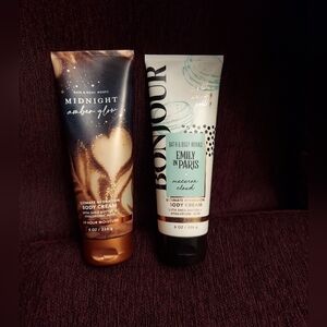 Emily in paris and midnight amber glow body creams by bath and body works